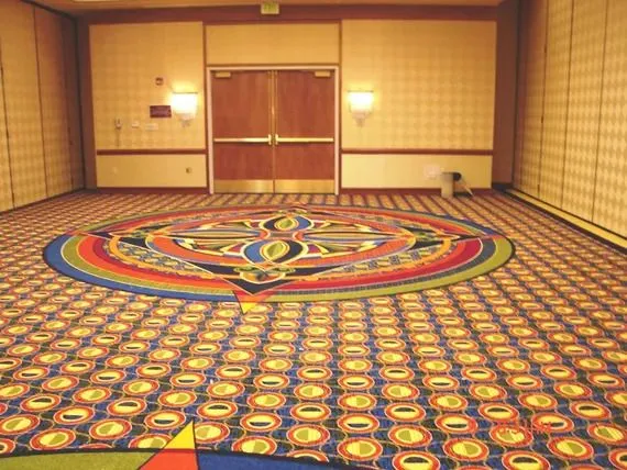 A colorful carpet in a conference room.